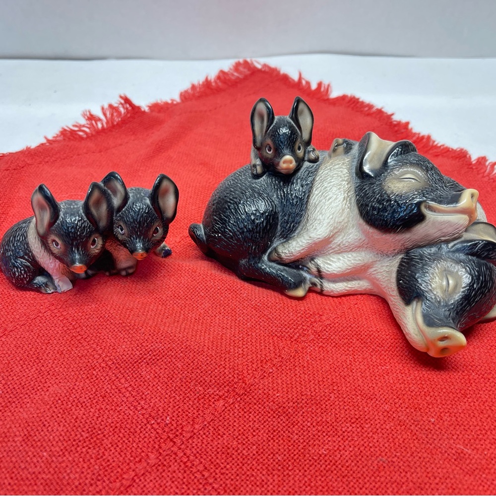 Adorable Black and White Pig Figurine Set